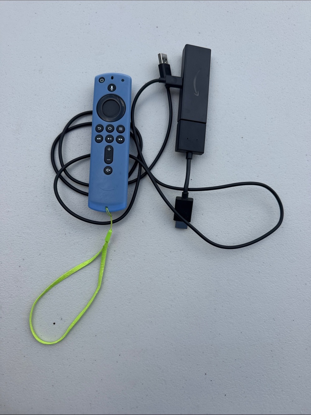 Amazon Blue Fire TV Remote with Neon Green Wrist Strap and Black Power Adapter